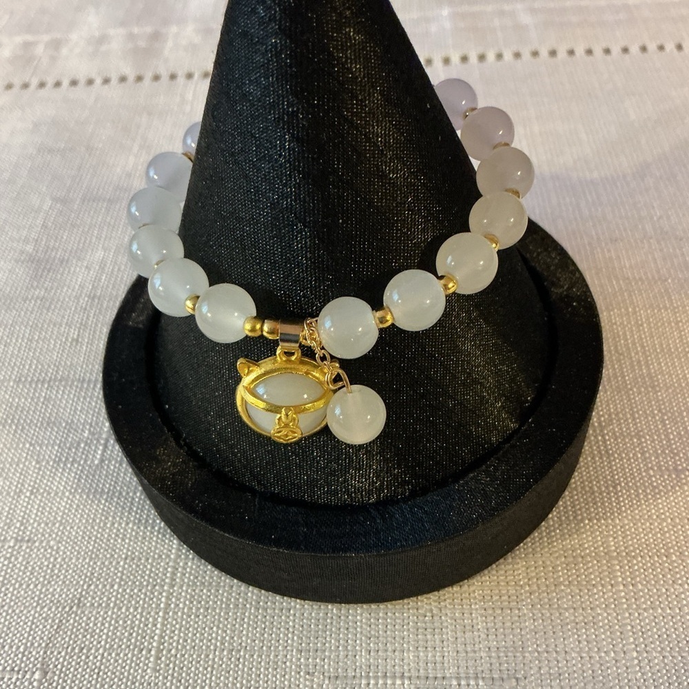 White Glass Beaded Gold Tone Charm Stretch Bracelet